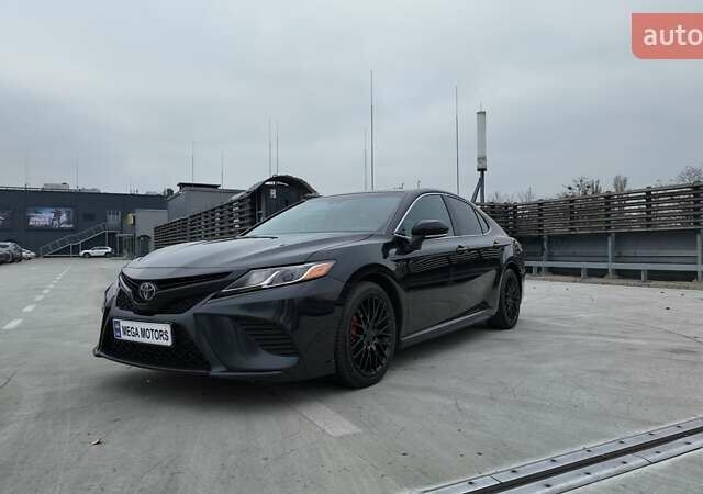 Чорний Тойота Камрі, об'ємом двигуна 2.49 л та пробігом 185 тис. км за 18990 $, фото 1 на Automoto.ua