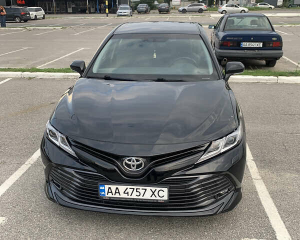 Черный Тойота Камри, объемом двигателя 2.49 л и пробегом 85 тыс. км за 22900 $, фото 1 на Automoto.ua