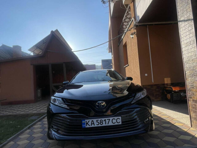Черный Тойота Камри, объемом двигателя 2.5 л и пробегом 115 тыс. км за 32000 $, фото 1 на Automoto.ua