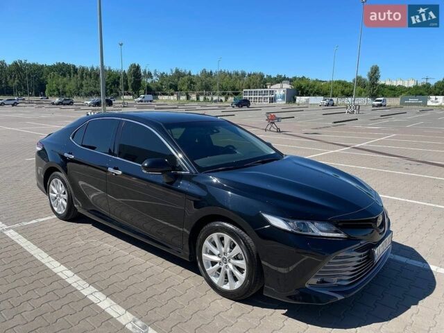 Черный Тойота Камри, объемом двигателя 2.49 л и пробегом 28 тыс. км за 27499 $, фото 1 на Automoto.ua