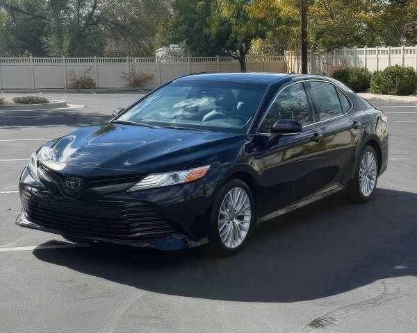 Черный Тойота Камри, объемом двигателя 2.5 л и пробегом 55 тыс. км за 6900 $, фото 1 на Automoto.ua