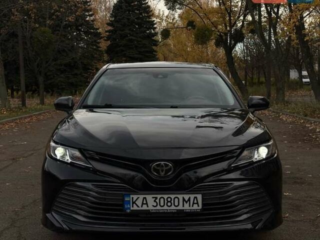 Черный Тойота Камри, объемом двигателя 2.49 л и пробегом 64 тыс. км за 24000 $, фото 1 на Automoto.ua