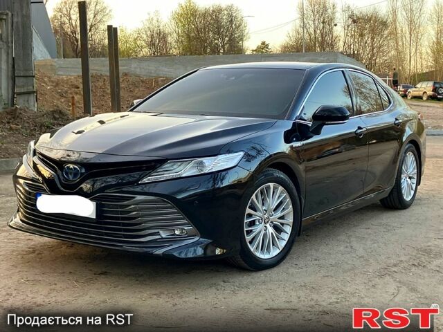 Черный Тойота Камри, объемом двигателя 2.5 л и пробегом 69 тыс. км за 30900 $, фото 1 на Automoto.ua