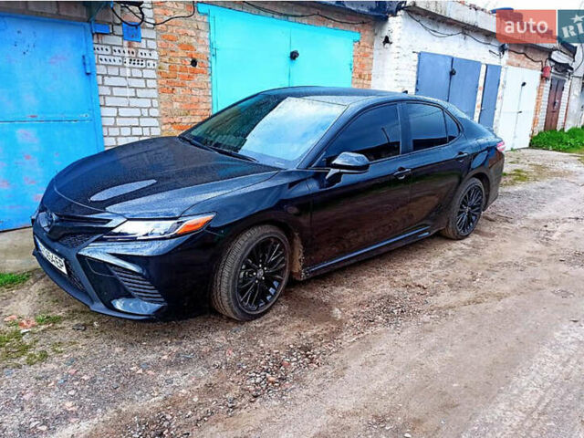 Черный Тойота Камри, объемом двигателя 2.5 л и пробегом 21 тыс. км за 23500 $, фото 1 на Automoto.ua