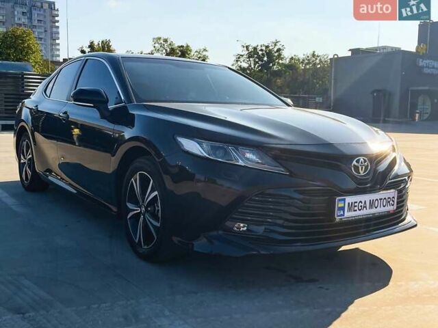 Чорний Тойота Камрі, об'ємом двигуна 2.49 л та пробігом 65 тис. км за 22990 $, фото 1 на Automoto.ua