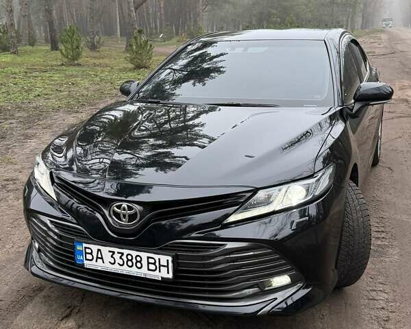 Черный Тойота Камри, объемом двигателя 2.49 л и пробегом 143 тыс. км за 23000 $, фото 1 на Automoto.ua