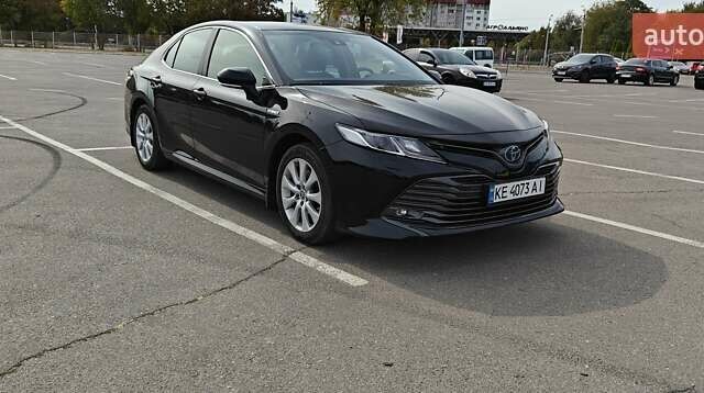 Черный Тойота Камри, объемом двигателя 2.49 л и пробегом 75 тыс. км за 29100 $, фото 1 на Automoto.ua