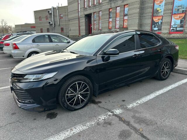 Черный Тойота Камри, объемом двигателя 2.5 л и пробегом 95 тыс. км за 24500 $, фото 1 на Automoto.ua