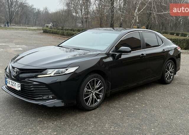 Черный Тойота Камри, объемом двигателя 2.49 л и пробегом 84 тыс. км за 25900 $, фото 1 на Automoto.ua