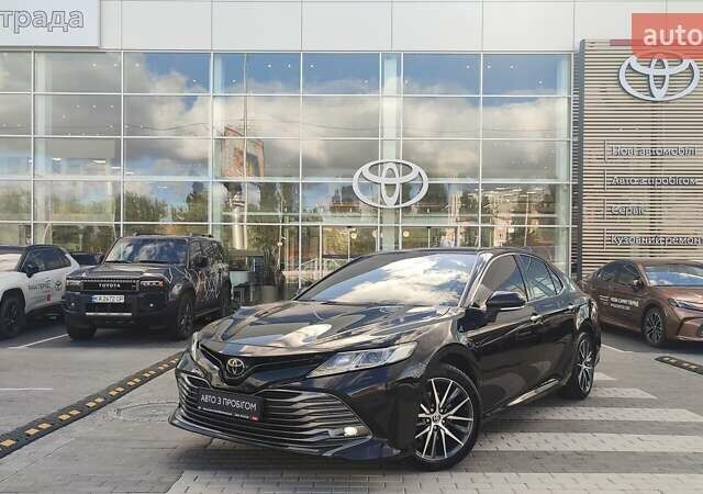 Черный Тойота Камри, объемом двигателя 2.49 л и пробегом 129 тыс. км за 23763 $, фото 1 на Automoto.ua