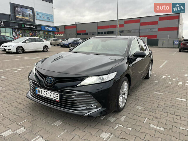 Черный Тойота Камри, объемом двигателя 2.49 л и пробегом 140 тыс. км за 27000 $, фото 1 на Automoto.ua