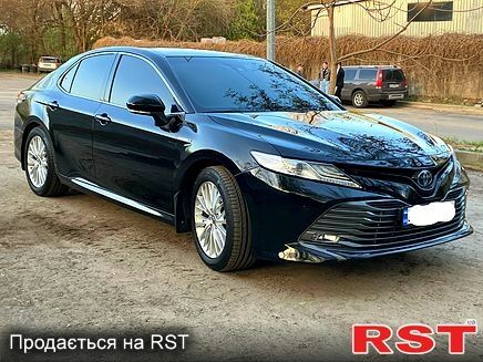 Черный Тойота Камри, объемом двигателя 2.5 л и пробегом 69 тыс. км за 30900 $, фото 1 на Automoto.ua