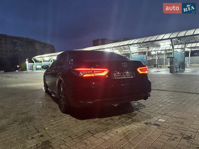 Чорний Тойота Камрі, об'ємом двигуна 2.49 л та пробігом 82 тис. км за 29000 $, фото 1 на Automoto.ua