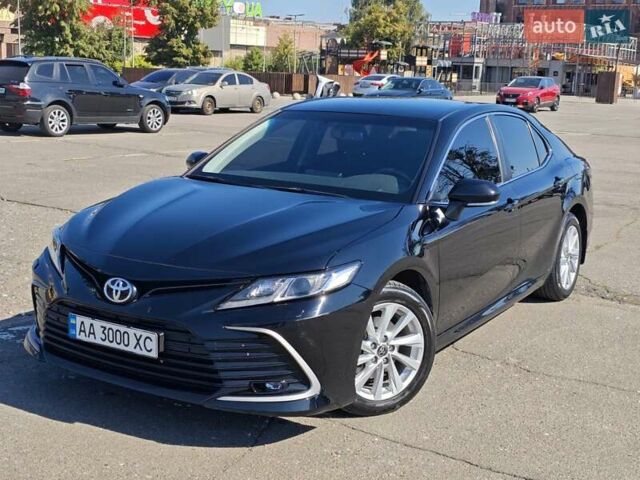 Черный Тойота Камри, объемом двигателя 2.49 л и пробегом 105 тыс. км за 26000 $, фото 1 на Automoto.ua