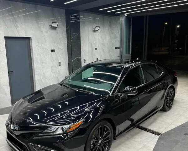 Чорний Тойота Камрі, об'ємом двигуна 2.49 л та пробігом 100 тис. км за 25000 $, фото 1 на Automoto.ua