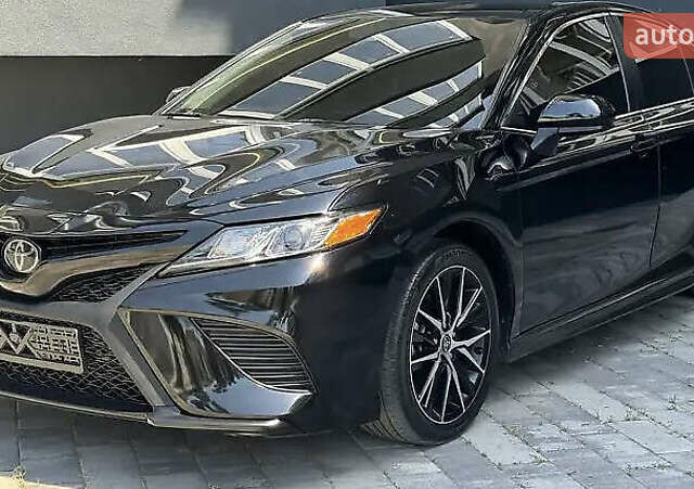 Чорний Тойота Камрі, об'ємом двигуна 2.49 л та пробігом 87 тис. км за 23000 $, фото 1 на Automoto.ua