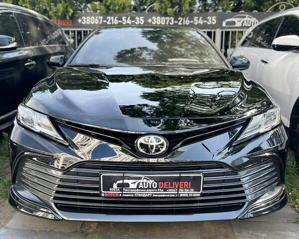 Черный Тойота Камри, объемом двигателя 2.49 л и пробегом 52 тыс. км за 20800 $, фото 1 на Automoto.ua