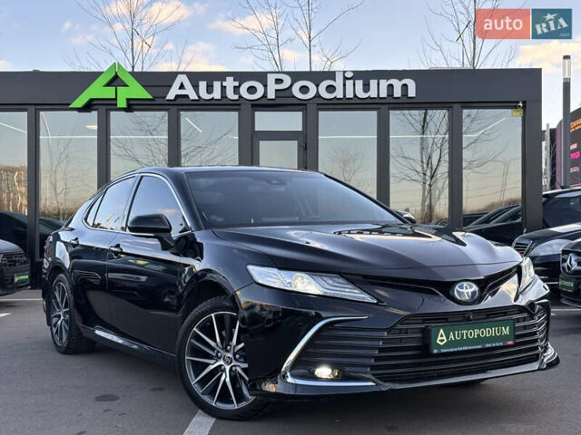 Черный Тойота Камри, объемом двигателя 2.49 л и пробегом 131 тыс. км за 32000 $, фото 1 на Automoto.ua