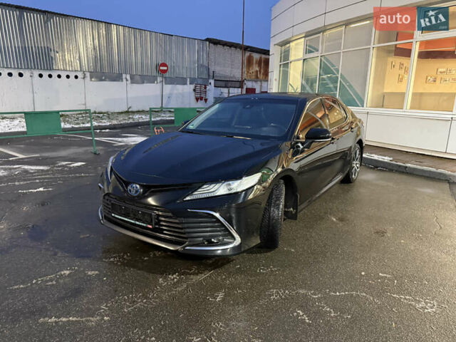 Черный Тойота Камри, объемом двигателя 2.49 л и пробегом 123 тыс. км за 27300 $, фото 1 на Automoto.ua