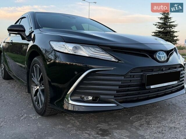 Черный Тойота Камри, объемом двигателя 2.49 л и пробегом 94 тыс. км за 34500 $, фото 1 на Automoto.ua