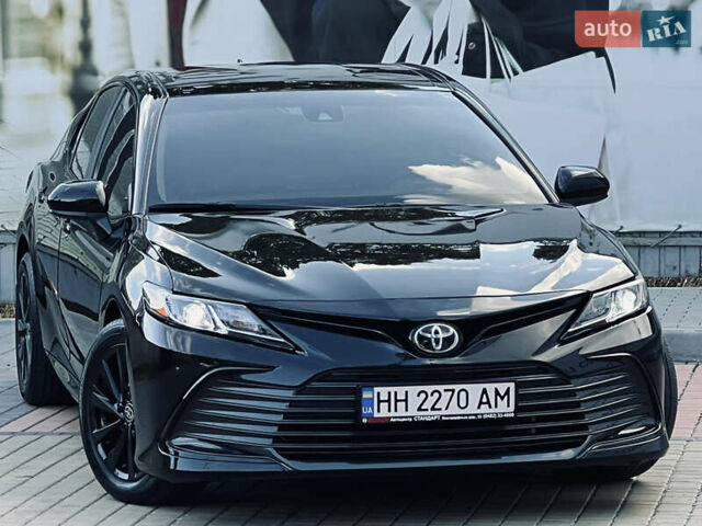 Чорний Тойота Камрі, об'ємом двигуна 2.5 л та пробігом 57 тис. км за 23700 $, фото 1 на Automoto.ua