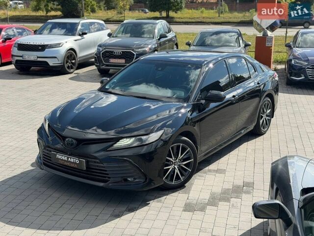 Чорний Тойота Камрі, об'ємом двигуна 2.49 л та пробігом 111 тис. км за 32000 $, фото 1 на Automoto.ua