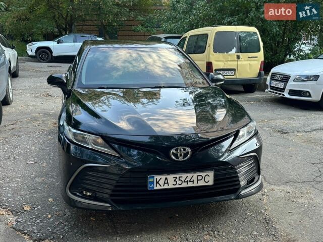 Чорний Тойота Камрі, об'ємом двигуна 2.49 л та пробігом 106 тис. км за 24000 $, фото 1 на Automoto.ua