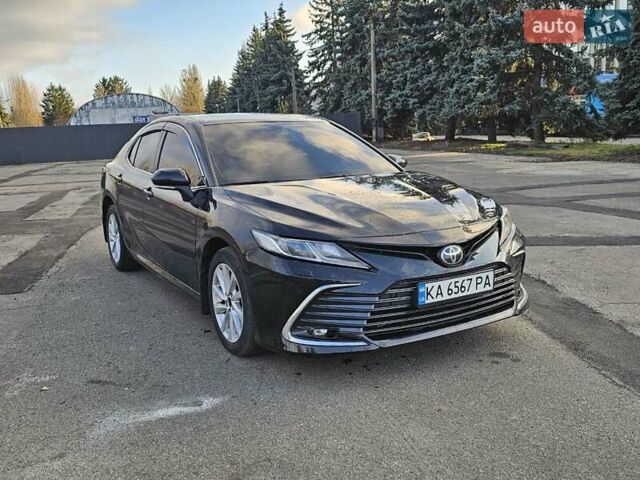 Черный Тойота Камри, объемом двигателя 2.49 л и пробегом 50 тыс. км за 22800 $, фото 1 на Automoto.ua
