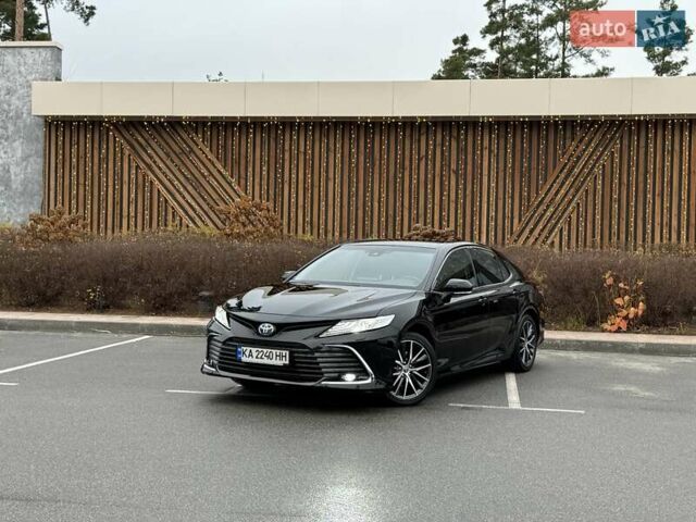 Черный Тойота Камри, объемом двигателя 2.49 л и пробегом 74 тыс. км за 33800 $, фото 1 на Automoto.ua