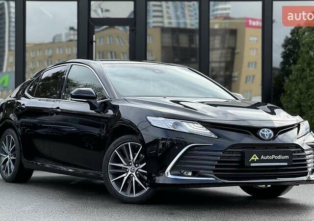 Черный Тойота Камри, объемом двигателя 2.49 л и пробегом 74 тыс. км за 33500 $, фото 1 на Automoto.ua