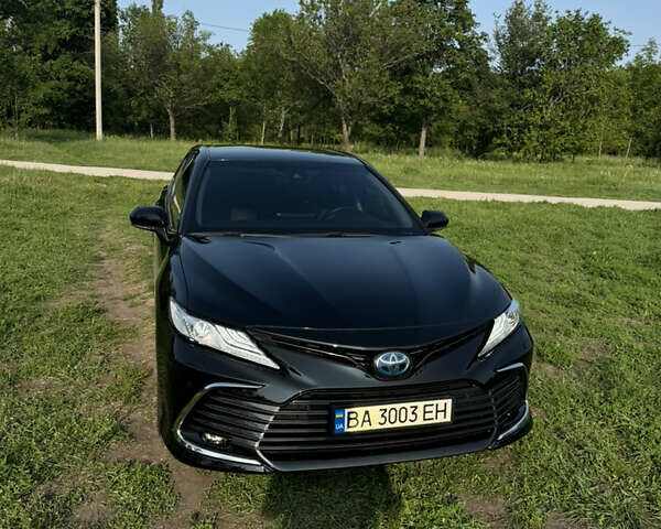 Черный Тойота Камри, объемом двигателя 2.49 л и пробегом 80 тыс. км за 35500 $, фото 1 на Automoto.ua