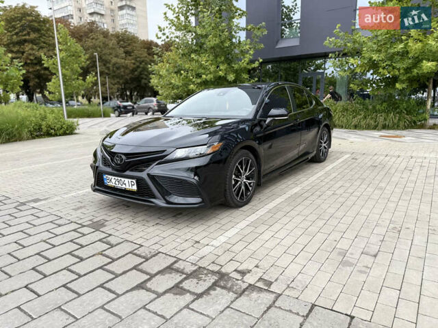 Черный Тойота Камри, объемом двигателя 2.49 л и пробегом 152 тыс. км за 24800 $, фото 1 на Automoto.ua