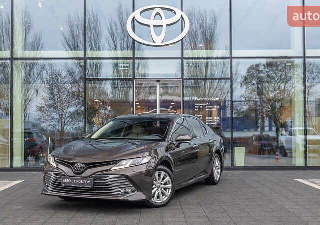 Коричневый Тойота Камри, объемом двигателя 2.49 л и пробегом 143 тыс. км за 21906 $, фото 1 на Automoto.ua