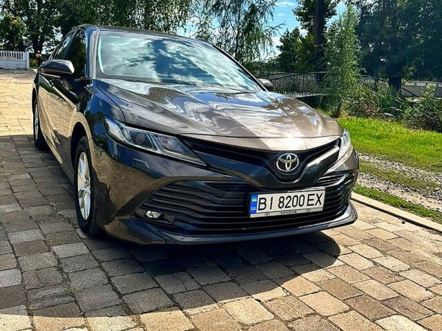 Коричневый Тойота Камри, объемом двигателя 2.5 л и пробегом 327 тыс. км за 16000 $, фото 1 на Automoto.ua