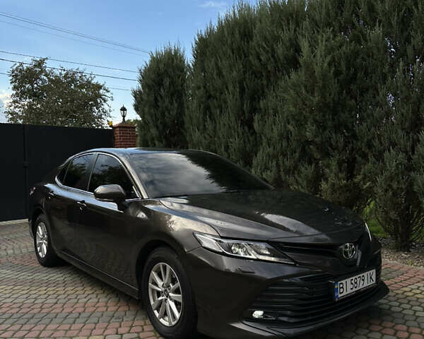 Коричневый Тойота Камри, объемом двигателя 2.49 л и пробегом 126 тыс. км за 21500 $, фото 1 на Automoto.ua