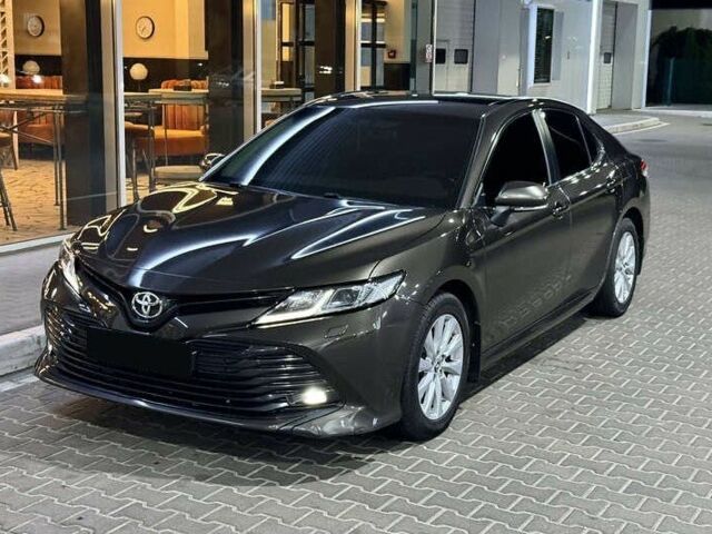 Коричневий Тойота Камрі, об'ємом двигуна 2.5 л та пробігом 106 тис. км за 17800 $, фото 1 на Automoto.ua