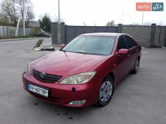 Красный Тойота Камри, объемом двигателя 2.4 л и пробегом 460 тыс. км за 5100 $, фото 1 на Automoto.ua