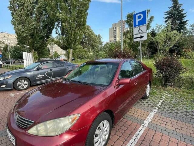 Красный Тойота Камри, объемом двигателя 2.4 л и пробегом 301 тыс. км за 4499 $, фото 1 на Automoto.ua