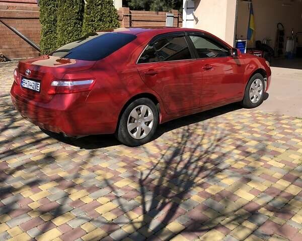 Красный Тойота Камри, объемом двигателя 2.36 л и пробегом 215 тыс. км за 7900 $, фото 1 на Automoto.ua