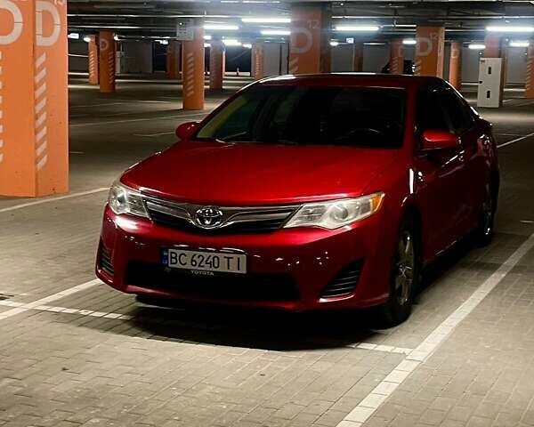 Червоний Тойота Камрі, об'ємом двигуна 2.49 л та пробігом 283 тис. км за 8600 $, фото 1 на Automoto.ua