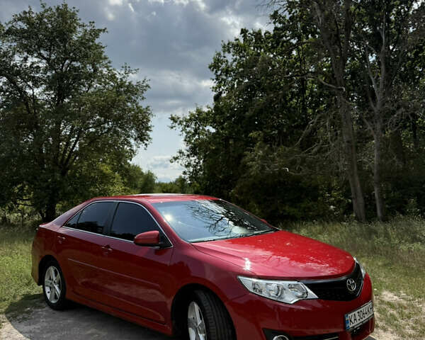 Красный Тойота Камри, объемом двигателя 2.49 л и пробегом 161 тыс. км за 13500 $, фото 1 на Automoto.ua