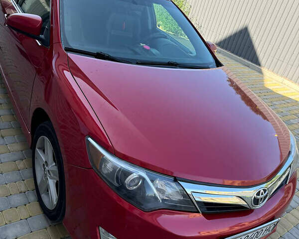 Красный Тойота Камри, объемом двигателя 2.5 л и пробегом 280 тыс. км за 11000 $, фото 1 на Automoto.ua