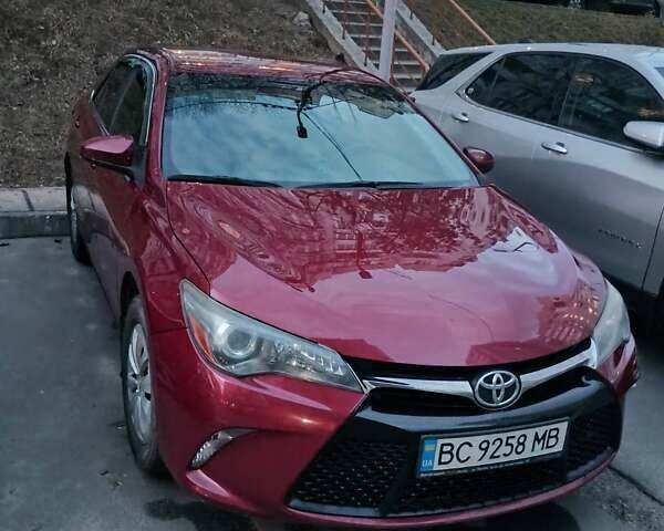 Красный Тойота Камри, объемом двигателя 2.49 л и пробегом 162 тыс. км за 11700 $, фото 1 на Automoto.ua