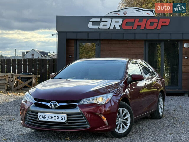 Красный Тойота Камри, объемом двигателя 2.49 л и пробегом 185 тыс. км за 11700 $, фото 1 на Automoto.ua