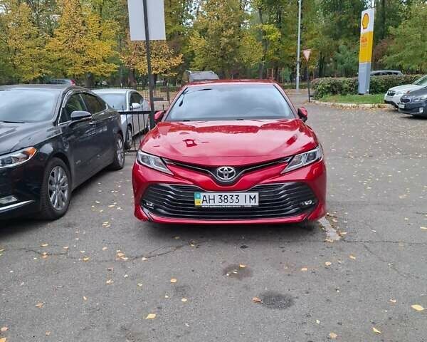 Красный Тойота Камри, объемом двигателя 2.49 л и пробегом 95 тыс. км за 23300 $, фото 1 на Automoto.ua