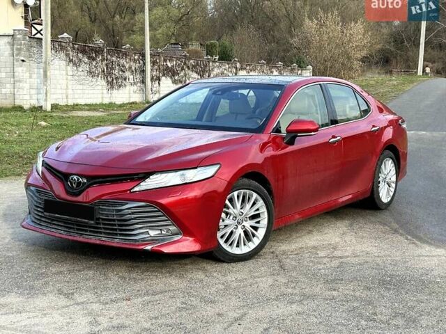Красный Тойота Камри, объемом двигателя 2.49 л и пробегом 59 тыс. км за 25700 $, фото 1 на Automoto.ua