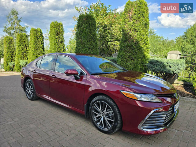 Красный Тойота Камри, объемом двигателя 2.49 л и пробегом 49 тыс. км за 32900 $, фото 1 на Automoto.ua