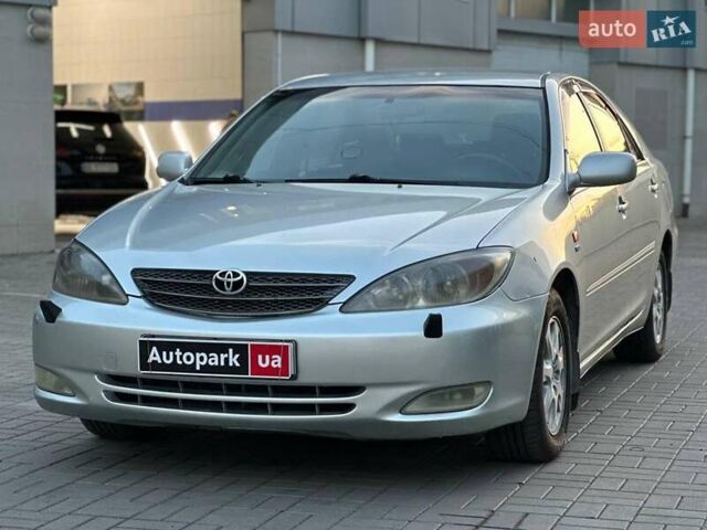 Тойота Камри, объемом двигателя 2.4 л и пробегом 246 тыс. км за 5990 $, фото 1 на Automoto.ua