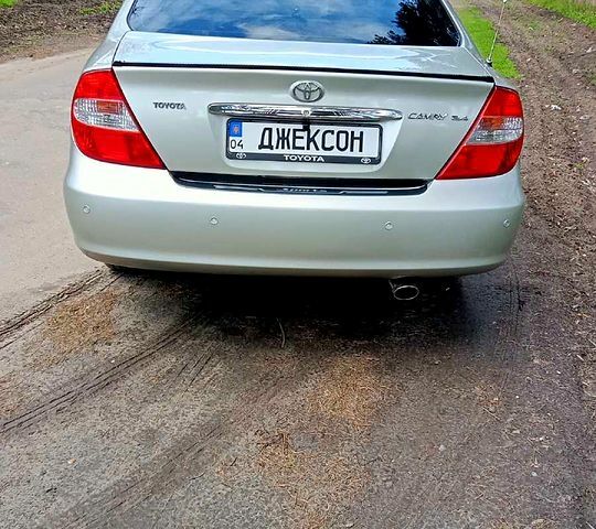 Тойота Камри, объемом двигателя 2.4 л и пробегом 290 тыс. км за 6500 $, фото 1 на Automoto.ua