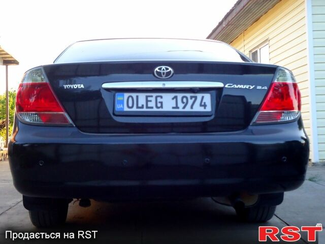 Тойота Камри, объемом двигателя 2.4 л и пробегом 300 тыс. км за 7500 $, фото 1 на Automoto.ua